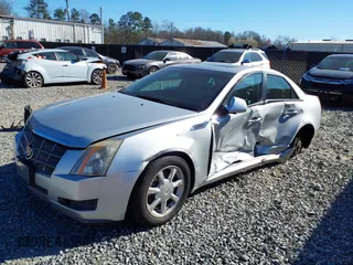 2009 Cadillac CTS AWD z VIN 1G6DS57V090127289, wystawiony jako IAAI lot #41675952 z przebiegiem 147 464 mil mil oraz . Historia ofert i sprzedaży dostępna na DreamBid. Obrazek 2.