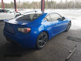2014 Subaru BRZ Limited with VIN JF1ZCAC18E9601688, listed as a IAAI auction lot 41708524 with 99,692 mi miles. Bid and sale history available at carsss.com. Image 4.