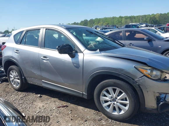 2013 Mazda CX-5 Sport z VIN JM3KE2BE9D0132928, wystawiony jako IAAI lot #41997589 z przebiegiem Nie podano mil oraz . Historia ofert i sprzedaży dostępna na DreamBid. Obrazek 12.