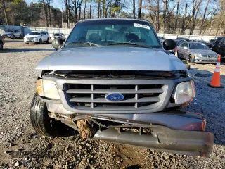 2002 Ford F-150 XL with VIN 1FTRF17202NB11513, listed as a Copart auction lot 85773084 with 120,443 mi miles and Salvage Title. Bid and sale history available at carsss.com. Image 5.