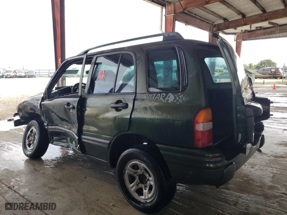 2000 Suzuki Vitara JLS with VIN 2S3TE52VXY6110157, listed as a Copart auction lot 79173714 with 165,283 mi miles and Non Repairable. Bid and sale history available at carsss.com. Image 2.