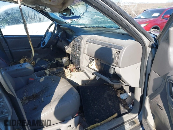 2001 Jeep Grand Cherokee Laredo with VIN 1J4GX48S51C735316, listed as a IAAI auction lot 41752349 with 214,101 mi miles and . Bid and sale history available at DreamBid. Image 5.