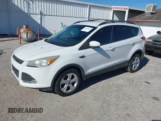 2013 Ford Escape SE with VIN 1FMCU0GX5DUB56405, listed as a IAAI auction lot 41829491 with 165,885 mi miles. Bid and sale history available at carsss.com. Image 2.