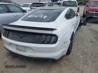 2022 Ford Mustang EcoBoost with VIN 1FA6P8TH7N5100487, listed as a IAAI auction lot 41948342 with 58,802 mi miles and . Bid and sale history available at DreamBid. Image 4.