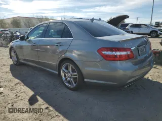 2011 Mercedes-Benz E 550 Luxury with VIN WDDHF7CB8BA305630, listed as a Copart auction lot 41521955 with 141,587 mi miles and Salvage Title. Bid and sale history available at DreamBid. Image 2.