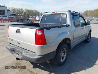 2004 Ford Explorer Sport Trac XLS z VIN 1FMZU77K74UA28903, wystawiony jako IAAI lot #41891563 z przebiegiem 186 399 mil mil oraz . Historia ofert i sprzedaży dostępna na DreamBid. Obrazek 4.