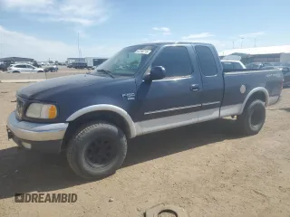 2001 Ford F-150 XL with VIN 1FTRX18L71NA27627, listed as a Copart auction lot 64190715 with 105,503 mi miles and Salvage title. Bid and sale history available at DreamBid. Image 1.