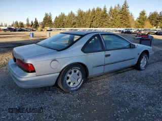 1995 Ford Thunderbird LX with VIN 1FALP62W5SH214974, listed as a Copart auction lot 42856995 with 150,454 mi miles and Clean Title. Bid and sale history available at DreamBid. Image 3.