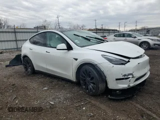 2022 Tesla Model Y Performance with VIN 7SAYGDEF1NF403693, listed as a Copart auction lot 53575845 with 34,302 mi miles and Salvage title. Bid and sale history available at DreamBid. Image 4.