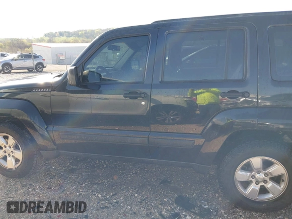 2012 Jeep Liberty Sport with VIN 1C4PJLAK9CW159310, listed as a IAAI auction lot 41987331 with 204,132 mi miles and . Bid and sale history available at carsss.com. Image 14.