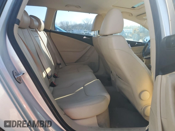 2009 Volkswagen Passat z VIN WVWXK73C99E046868, wystawiony jako Copart lot #79549784 z przebiegiem 167 784 mil mil oraz Szkoda całkowita • Salvage title. Historia ofert i sprzedaży dostępna na DreamBid. Obrazek 10.