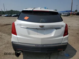 2017 Cadillac XT5 Luxury FWD with VIN 1GYKNBRS2HZ296859, listed as a Copart auction lot 64982445 with 30,765 mi miles and Salvage title. Bid and sale history available at DreamBid. Image 6.
