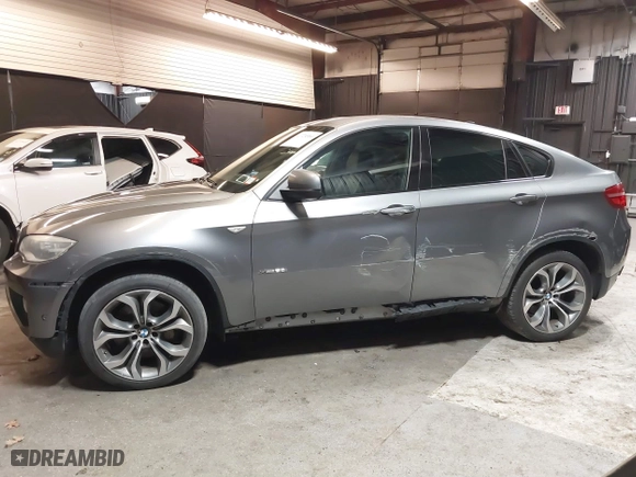 2014 BMW X6 50i with VIN 5UXFG8C55EL592995, listed as a IAAI auction lot 41724960 with 137,112 mi miles. Bid and sale history available at carsss.com. Image 15.