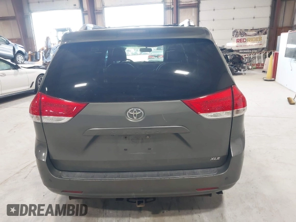2011 Toyota Sienna XLE AAS with VIN 5TDYK3DC8BS111639, listed as a IAAI auction lot 42108488 with 300,872 mi miles and . Bid and sale history available at DreamBid. Image 16.