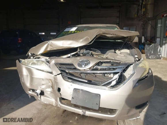 2009 Toyota Camry Hybrid with VIN JTNBB46K793052834, listed as a IAAI auction lot 41795017 with 243,223 mi miles. Bid and sale history available at carsss.com. Image 12.
