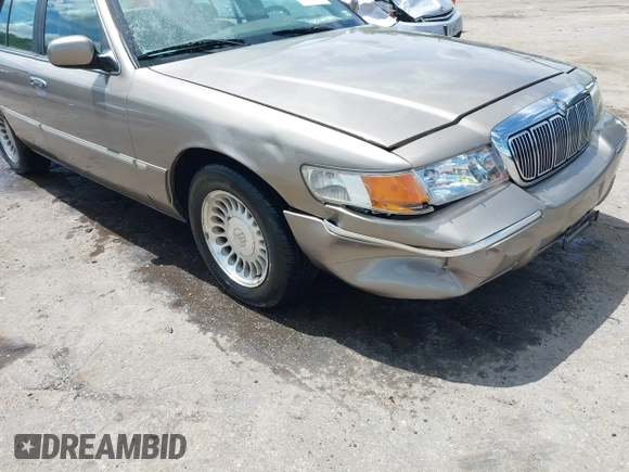 2001 Mercury Grand Marquis LS z VIN 2MEFM75W31X704182, wystawiony jako IAAI lot #42086175 z przebiegiem 177 892 mil mil oraz . Historia ofert i sprzedaży dostępna na DreamBid. Obrazek 6.