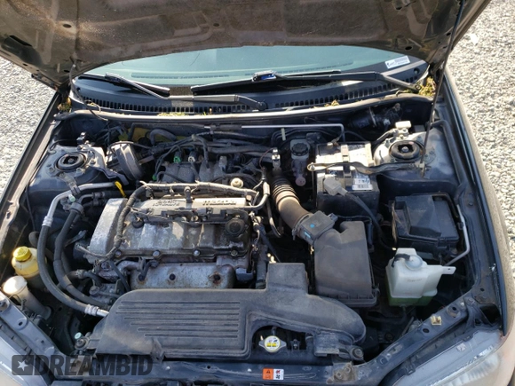 2003 Mazda Protege DX with VIN JM1BJ226231214537, listed as a Copart auction lot 54448615 with 147,753 mi miles and Salvage Title. Bid and sale history available at DreamBid. Image 11.