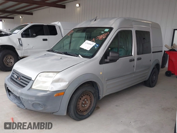 2010 Ford Transit Connect XL with VIN NM0LS6AN8AT028971, listed as a IAAI auction lot 41568507 with 238,621 mi miles and . Bid and sale history available at DreamBid. Image 2.