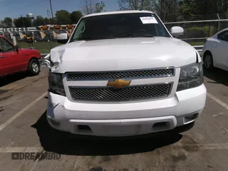 2014 Chevrolet Suburban LT with VIN 1GNSCJE05ER117663, listed as a IAAI auction lot 41992835 with 208,754 mi miles. Bid and sale history available at carsss.com. Image 12.