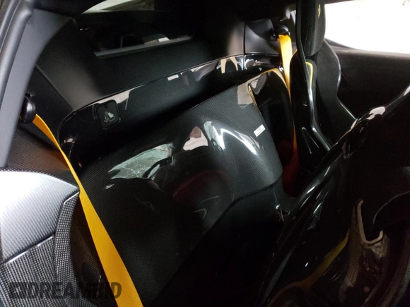 2023 Ferrari SF90 z VIN ZFF95NLA8P0299159, wystawiony jako Copart lot #52724044 z przebiegiem Nie podano mil oraz Szkody całkowita. Historia ofert i sprzedaży dostępna na DreamBid. Obrazek 10.