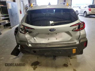 2024 Subaru Crosstrek Wilderness с VIN 4S4GUHU69R3783214, выставлен на аукционе Copart как лот 48541255 с пробегом 8 895 миль миль и Списание • Salvage title. История ставок и продаж доступна на DreamBid. Изображение 6.