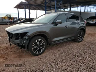 2022 Mazda CX-5 2.5 S Premium Package with VIN JM3KFBDM8N0590642, listed as a Copart auction lot 48996015 with 12,654 mi miles and Salvage Title. Bid and sale history available at carsss.com. Image 1.