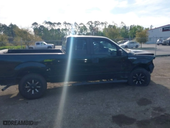 2014 Ford F-150 XL with VIN 1FTEX1CM4EKG06516, listed as a IAAI auction lot 41877641 with 202,729 mi miles. Bid and sale history available at carsss.com. Image 13.