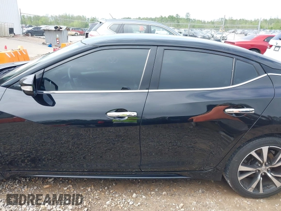 2018 Nissan Maxima SL with VIN 1N4AA6AP5JC393421, listed as a IAAI auction lot 41934608 with 127,237 mi miles and . Bid and sale history available at DreamBid. Image 14.