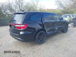 2017 Dodge Durango R/T with VIN 1C4SDJCT2HC935619, listed as a IAAI auction lot 41959296 with 97,283 mi miles and . Bid and sale history available at DreamBid. Image 4.