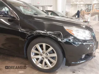 2013 Chevrolet Malibu LTZ with VIN 1G11H5SA1DU129095, listed as a IAAI auction lot 41556006 with 170,477 mi miles and . Bid and sale history available at DreamBid. Image 6.