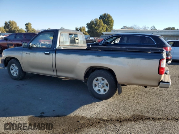 1993 Toyota T100 z VIN JT4VD10C2P0007486, wystawiony jako Copart lot #77669724 z przebiegiem 150 936 mil mil oraz Tytuł czysty. Historia ofert i sprzedaży dostępna na DreamBid. Obrazek 2.