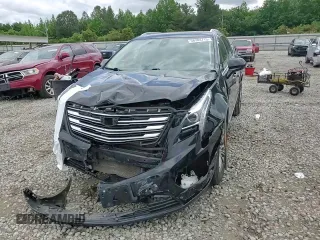 2019 Cadillac XT5 Luxury FWD с VIN 1GYKNCRS7KZ104400, выставлен на аукционе Copart как лот 58704715 с пробегом 80 676 миль миль и Списание • Salvage title. История ставок и продаж доступна на DreamBid. Изображение 14.