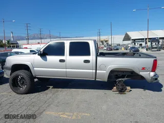 2005 Chevrolet Silverado 1500 LS with VIN 2GCEK13T351136405, listed as a IAAI auction lot 41684903 with 303,874 mi miles. Bid and sale history available at carsss.com. Image 13.