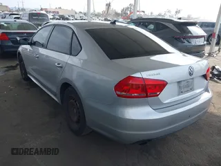 2015 Volkswagen Passat 1.8T Limited Edition with VIN 1VWAT7A34FC077021, listed as a IAAI auction lot 42090573 with 230,465 mi miles. Bid and sale history available at carsss.com. Image 3.