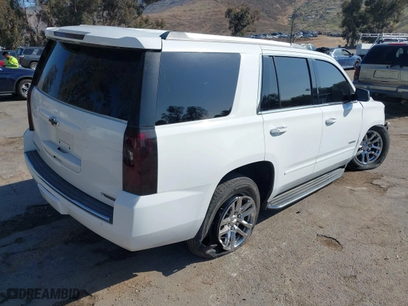 2018 Chevrolet Tahoe Premier with VIN 1GNSCCKC2JR111159, listed as a IAAI auction lot 41523695 with 69,352 mi miles. Bid and sale history available at carsss.com. Image 4.
