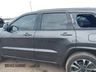 2021 Jeep Grand Cherokee 80th Anniversary with VIN 1C4RJFBG8MC728364, listed as a IAAI auction lot 39803814 with 34,000 mi miles and . Bid and sale history available at DreamBid. Image 14.