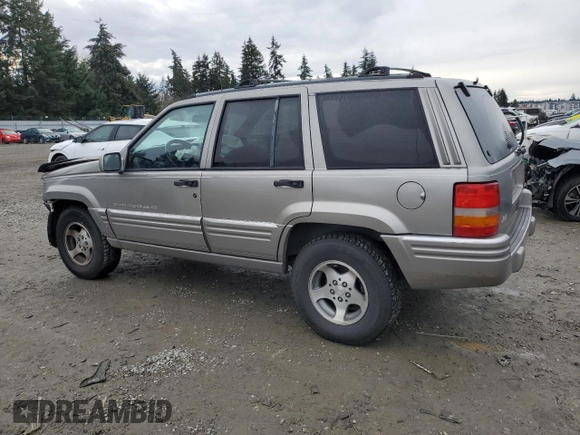 1997 Jeep Grand Cherokee Limited with VIN 1J4GZ78Y4VC693193, listed as a Copart auction lot 46327885 with 235,553 mi miles and Salvage Title. Bid and sale history available at carsss.com. Image 2.
