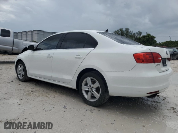 2014 Volkswagen Jetta TDI w/Premium with VIN 3VWLL7AJ2EM266867, listed as a Copart auction lot 52174475 with 73,574 mi miles and Salvage title. Bid and sale history available at DreamBid. Image 2.