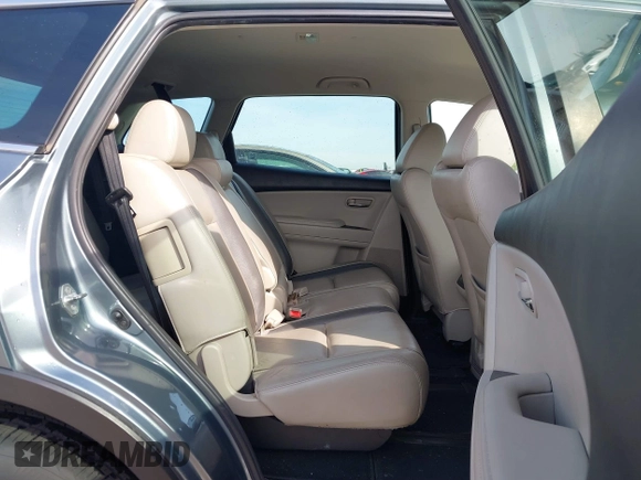 2011 Mazda CX-9 Touring z VIN JM3TB3CV6B0308283, wystawiony jako IAAI lot #41739538 z przebiegiem 96 507 mil mil oraz . Historia ofert i sprzedaży dostępna na DreamBid. Obrazek 8.