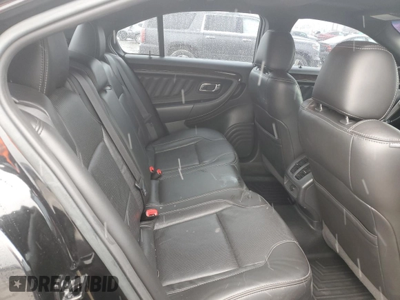 2013 Ford Taurus Limited z VIN 1FAHP2F80DG216618, wystawiony jako Copart lot #85572994 z przebiegiem 185 697 mil mil oraz Szkoda całkowita • Salvage title. Historia ofert i sprzedaży dostępna na DreamBid. Obrazek 10.