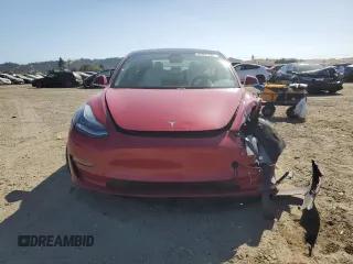 2019 Tesla Model 3 Mid Range z VIN 5YJ3E1EA3KF312453, wystawiony jako Copart lot #57841605 z przebiegiem 77 366 mil mil oraz Szkoda całkowita • Salvage title. Historia ofert i sprzedaży dostępna na DreamBid. Obrazek 5.
