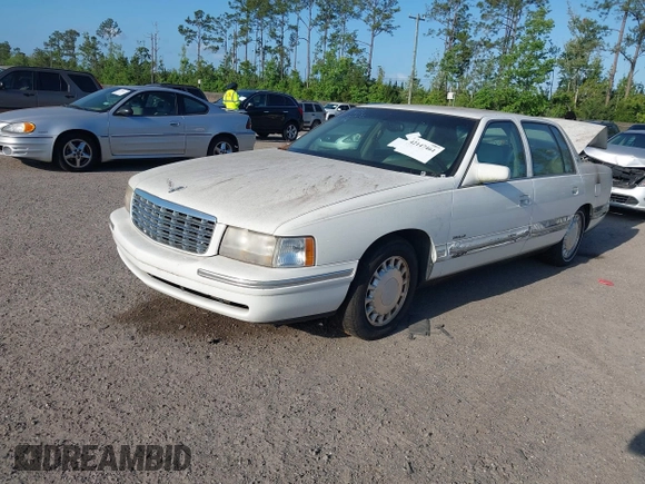 1999 Cadillac DeVille z VIN 1G6KD54Y7XU720668, wystawiony jako IAAI lot #42147461 z przebiegiem 92 054 mil mil oraz . Historia ofert i sprzedaży dostępna na DreamBid. Obrazek 2.