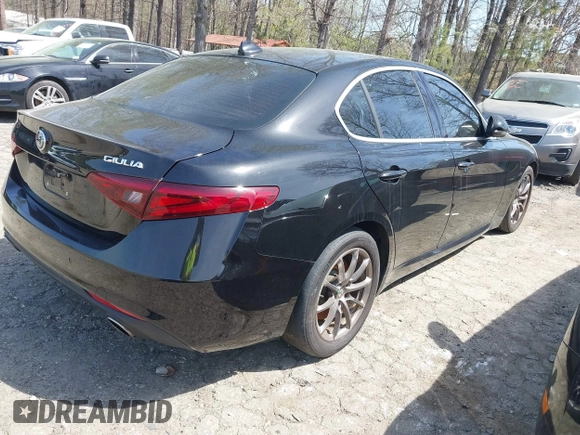 2018 Alfa Romeo Giulia with VIN ZARFAEBN7J7580536, listed as a IAAI auction lot 41883289 with 87,776 mi miles. Bid and sale history available at carsss.com. Image 4.