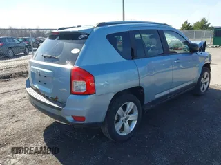 2013 Jeep Compass Latitude with VIN 1C4NJDEB2DD263920, listed as a IAAI auction lot 41832542 with 128,018 mi miles. Bid and sale history available at carsss.com. Image 4.