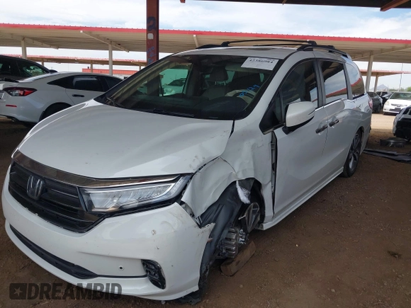2021 Honda Odyssey Touring z VIN 5FNRL6H85MB034888, wystawiony jako IAAI lot #42386984 z przebiegiem 40 514 mil mil oraz . Historia ofert i sprzedaży dostępna na DreamBid. Obrazek 17.