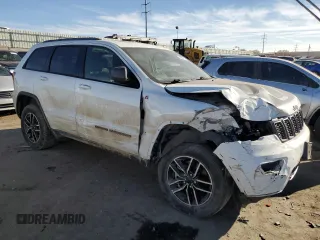 2021 Jeep Grand Cherokee Trailhawk with VIN 1C4RJFLG3MC646573, listed as a Copart auction lot 82687014 with 83,294 mi miles and Salvage Title. Bid and sale history available at carsss.com. Image 4.
