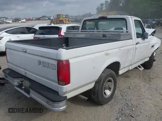 1995 Ford F-150 z VIN 1FTDF15Y2SLA09272, wystawiony jako IAAI lot #42292685 z przebiegiem 179 813 mil mil oraz . Historia ofert i sprzedaży dostępna na DreamBid. Obrazek 4.