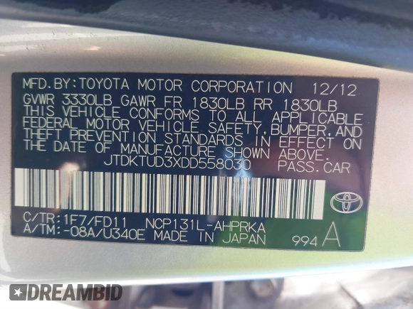 2013 Toyota Yaris L with VIN JTDKTUD3XDD558030, listed as a IAAI auction lot 41775567 with 246,051 mi miles. Bid and sale history available at carsss.com. Image 9.