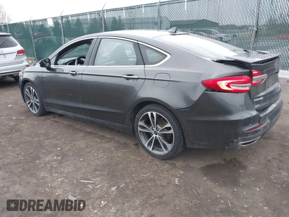 2019 Ford Fusion Titanium with VIN 3FA6P0K9XKR259556, listed as a IAAI auction lot 41823997 with 132,071 mi miles. Bid and sale history available at carsss.com. Image 3.