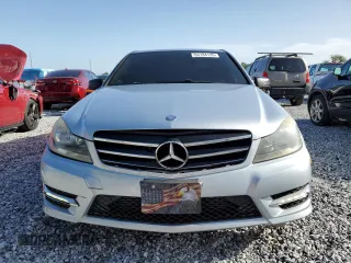2014 Mercedes-Benz C 250 Sport with VIN WDDGF4HB8EA955064, listed as a Copart auction lot 63184135 with 104,735 mi miles and Salvage title. Bid and sale history available at DreamBid. Image 5.